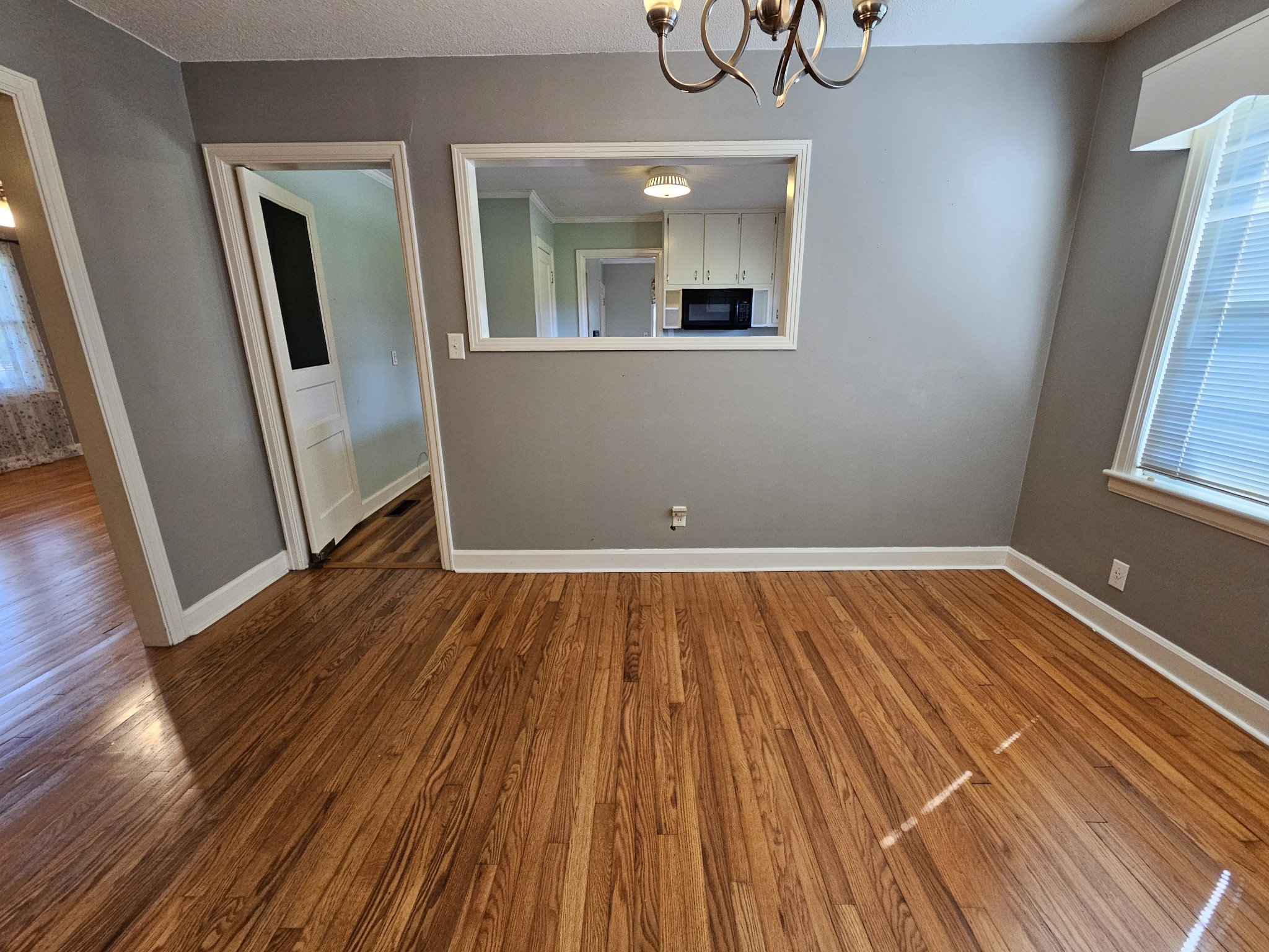 612 Jackson Avenue Carthage, TN 37030 - Photo 37 of 65 a view of a room with wooden floor and windows