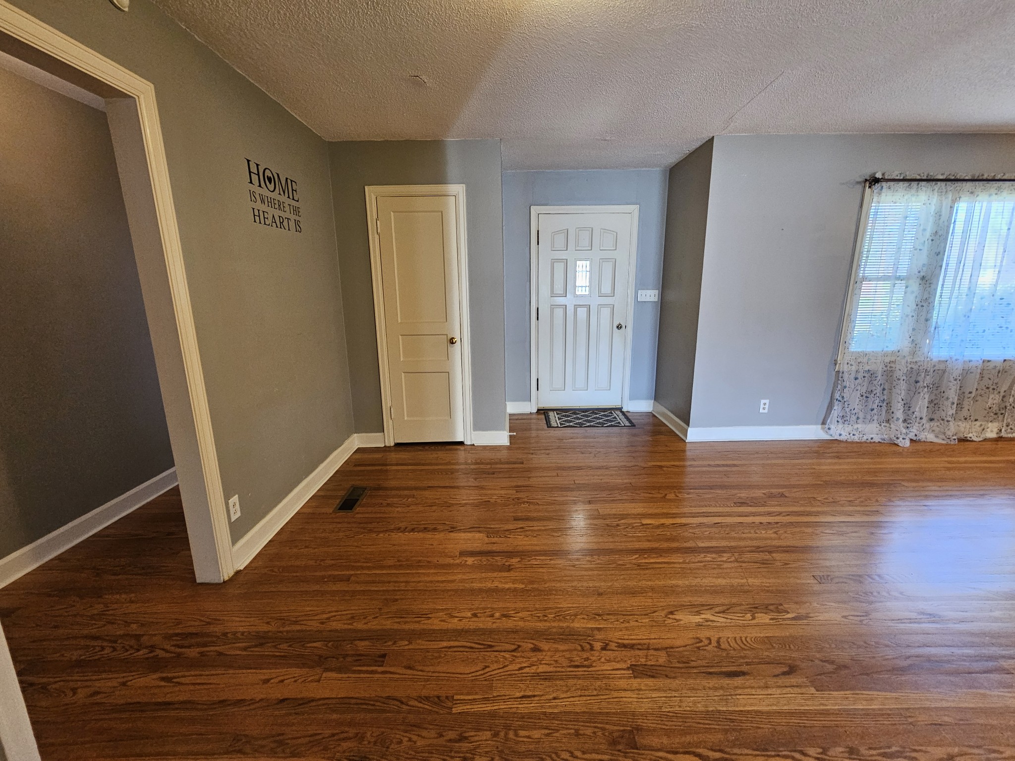 612 Jackson Avenue Carthage, TN 37030 - Photo 41 of 64 a view of room with window and wooden floor
