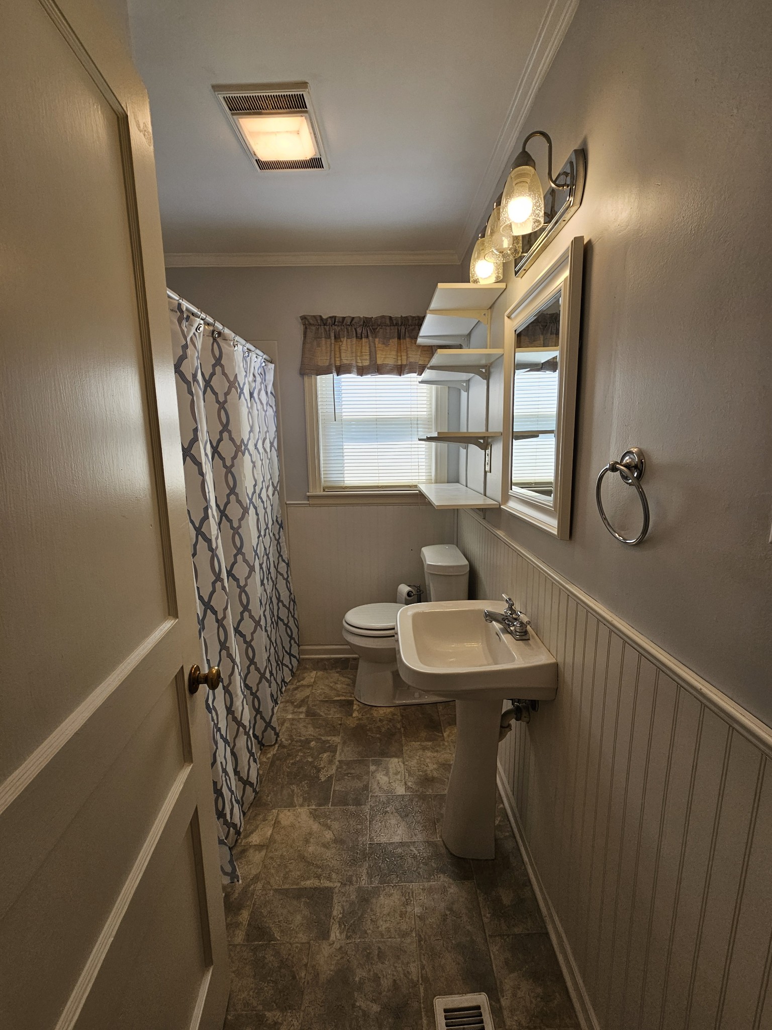 612 Jackson Avenue Carthage, TN 37030 - Photo 46 of 64 a bathroom with a sink a toilet and shower