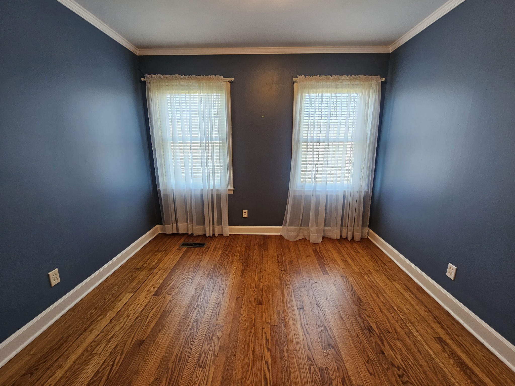612 Jackson Avenue Carthage, TN 37030 - Photo 55 of 65 an empty room with wooden floor and windows