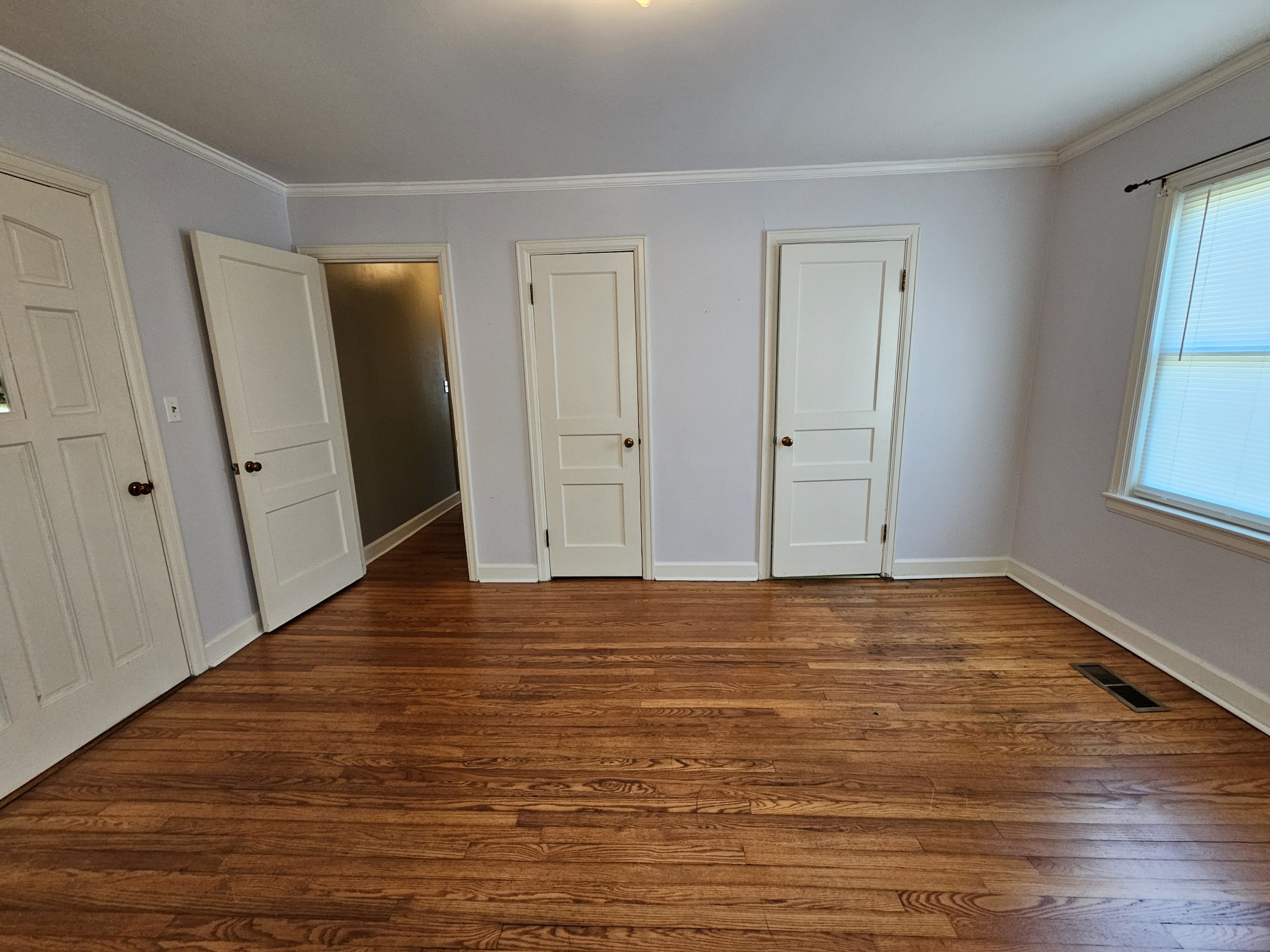 612 Jackson Avenue Carthage, TN 37030 - Photo 58 of 64 a view of an empty room with wooden floor and a window