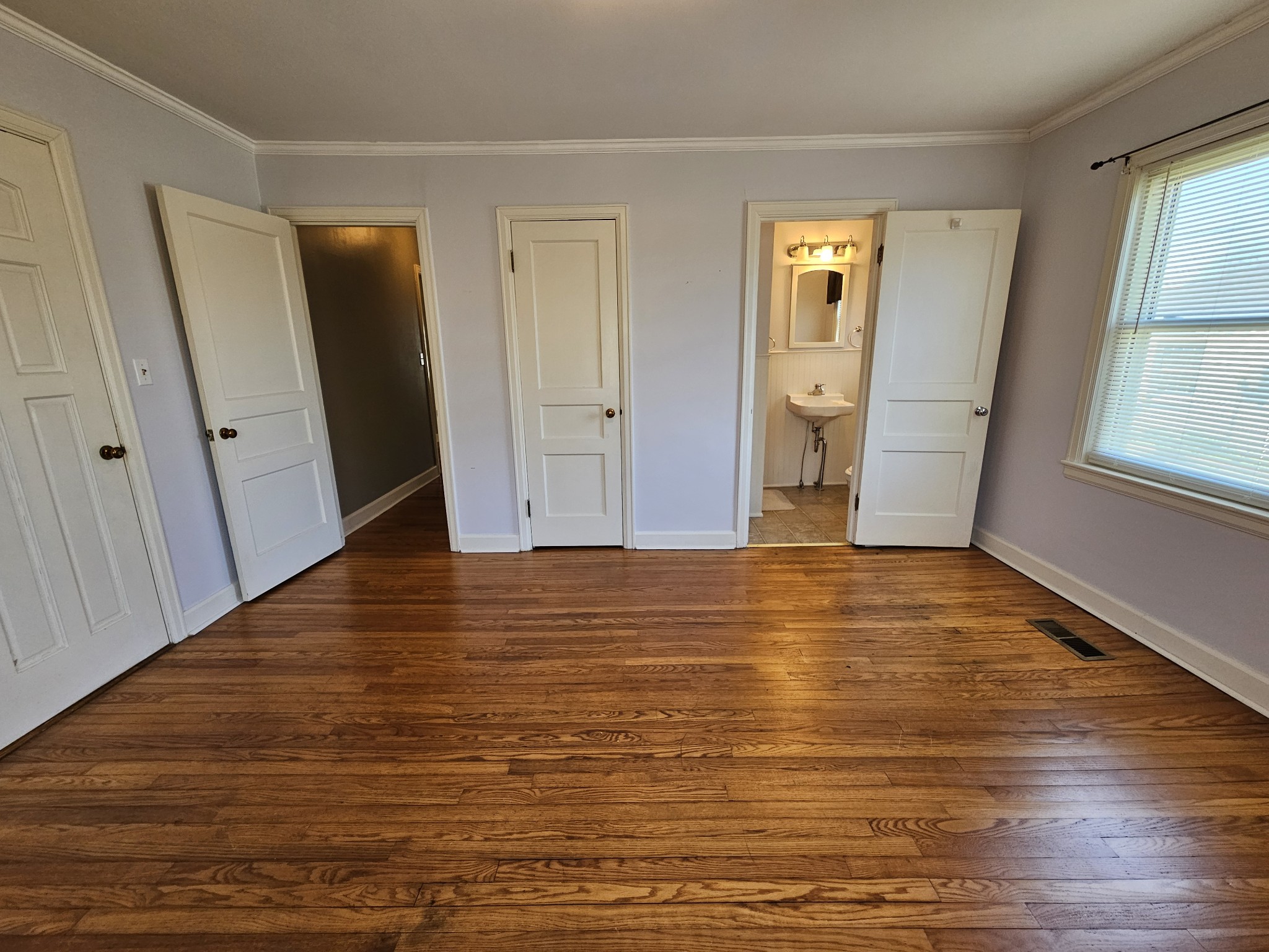 612 Jackson Avenue Carthage, TN 37030 - Photo 62 of 65 a view of empty room with wooden floor and window