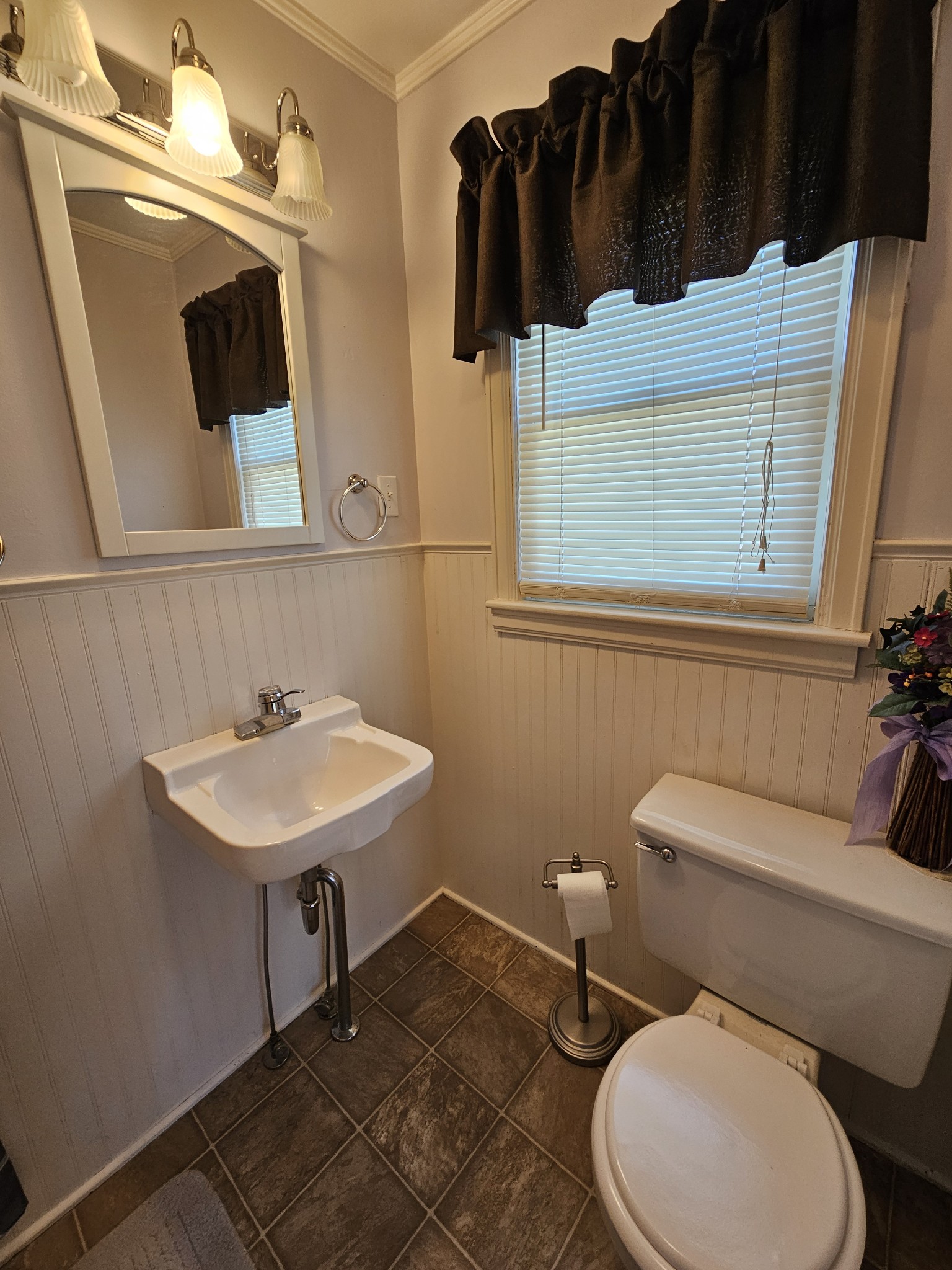 612 Jackson Avenue Carthage, TN 37030 - Photo 64 of 65 a bathroom with a toilet sink and mirror