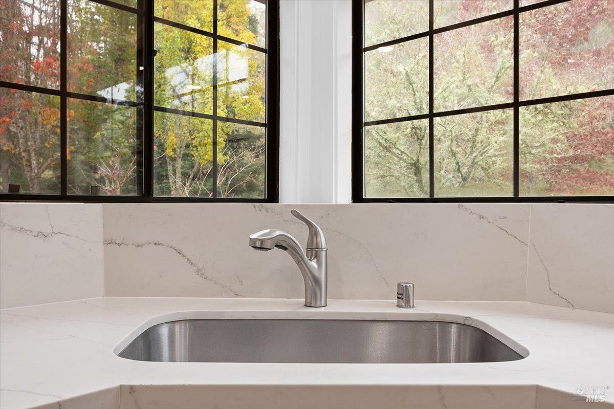 668 Wild Oak Drive Santa Rosa, CA 95409 - Photo 22 of 46 a bathroom with a sink and a large window