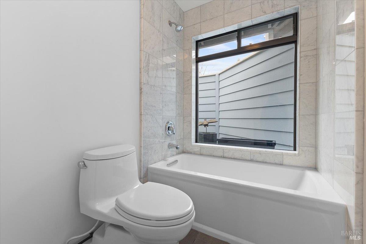 668 Wild Oak Drive Santa Rosa, CA 95409 - Photo 27 of 46 a bathroom with a toilet and a bathtub