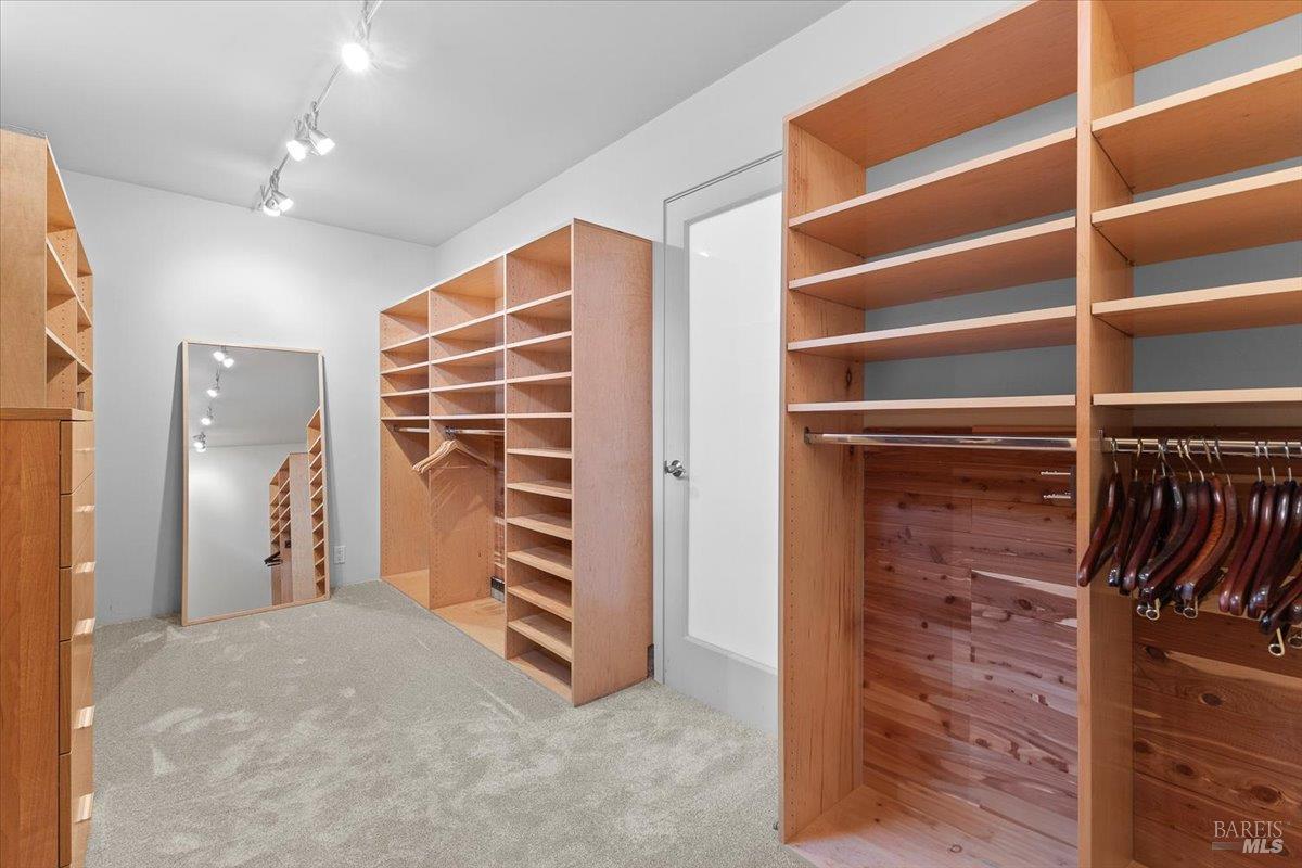 668 Wild Oak Drive Santa Rosa, CA 95409 - Photo 34 of 46 a view of walk in closet with clothes and shoes