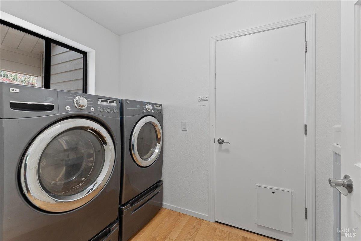 668 Wild Oak Drive Santa Rosa, CA 95409 - Photo 38 of 46 a utility room with dryer and washer