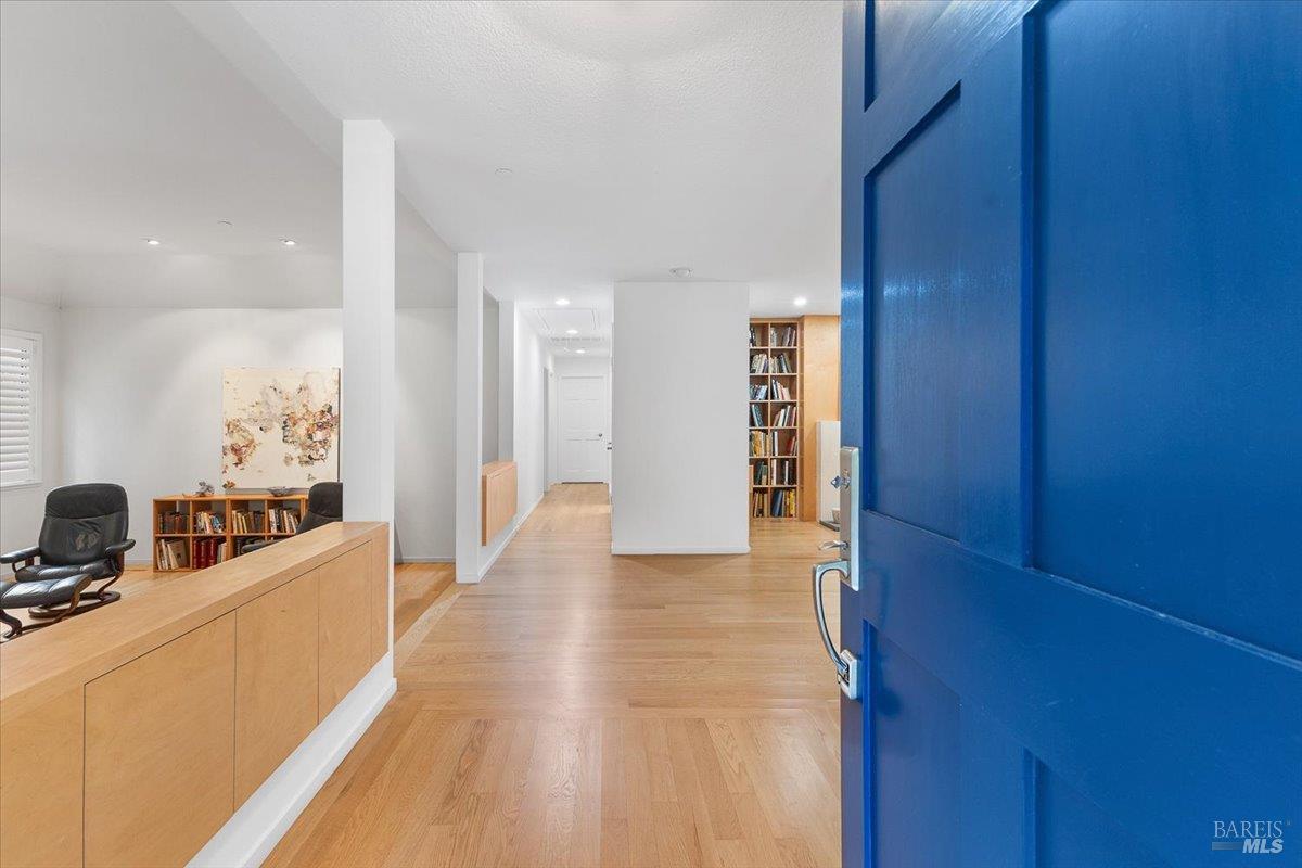 668 Wild Oak Drive Santa Rosa, CA 95409 - Photo 5 of 46 a view of a hallway with furniture and floor to ceiling window