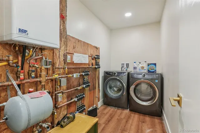 a utility room with dryer and washer