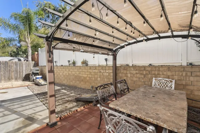 a view of a terrace with seating area