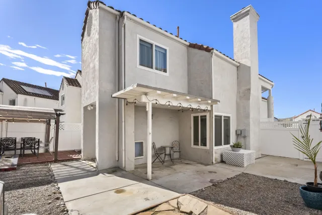 a view of a house with a patio