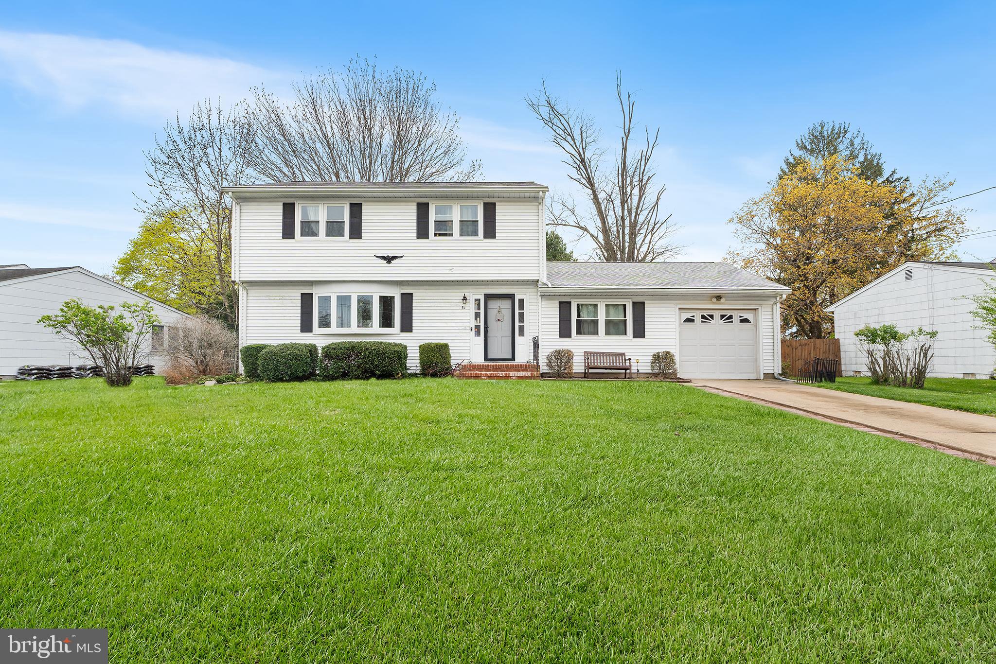 a view of a house with a back yard