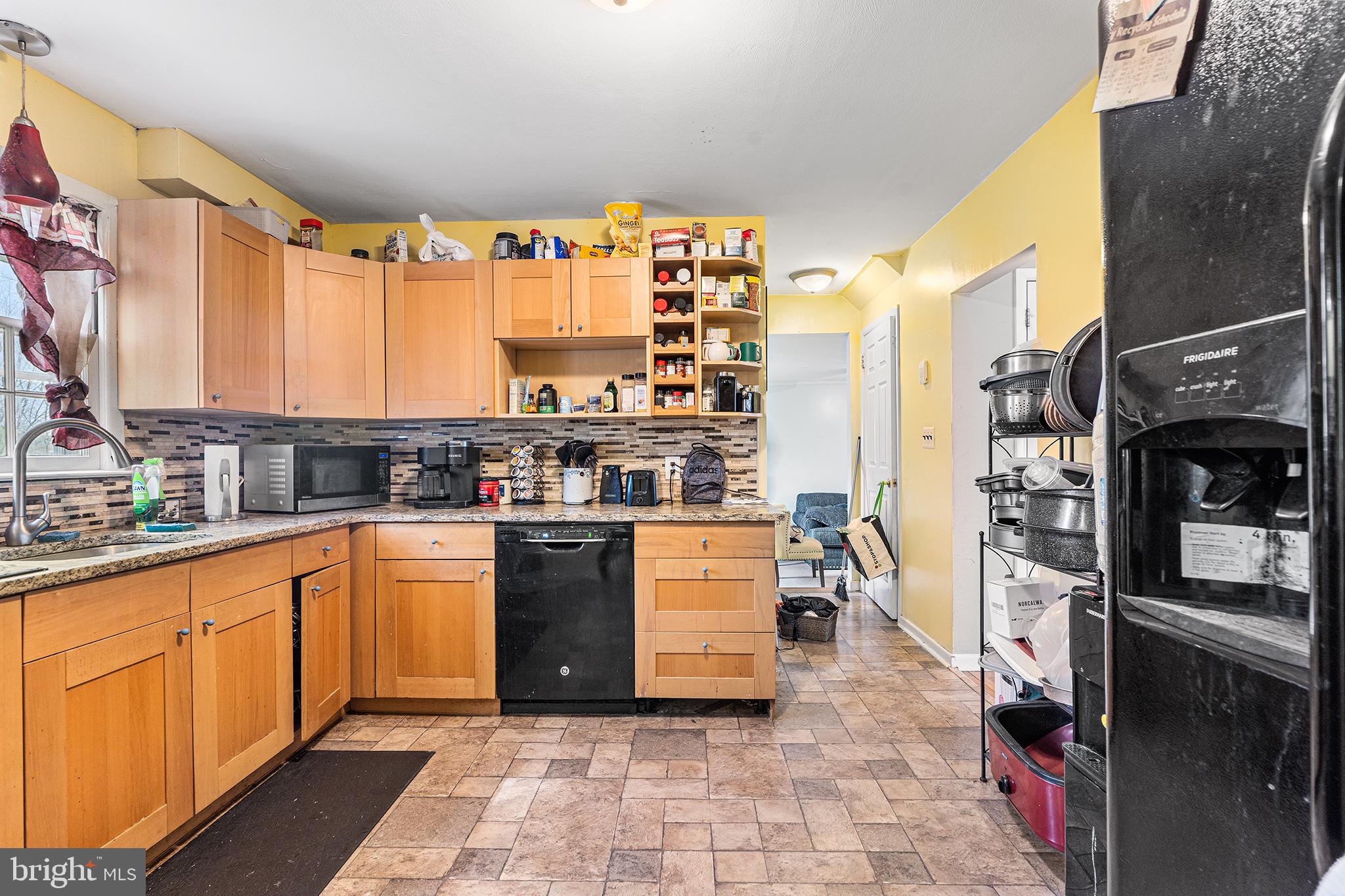 80 Nancy Lane Ewing, NJ 08638 - Photo 16 of 33 a kitchen with stainless steel appliances granite countertop a stove top oven a sink and dishwasher