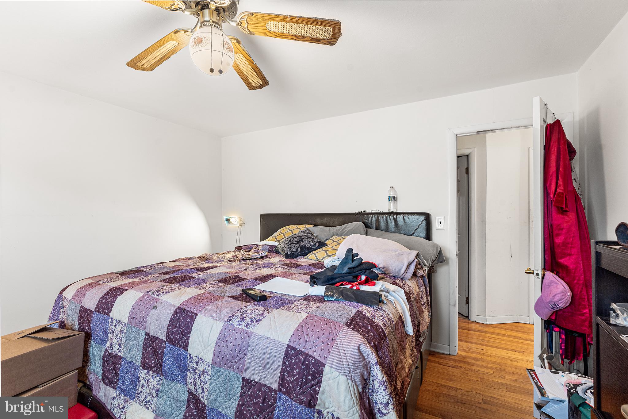 80 Nancy Lane Ewing, NJ 08638 - Photo 20 of 33 a bedroom with a bed and a chandelier