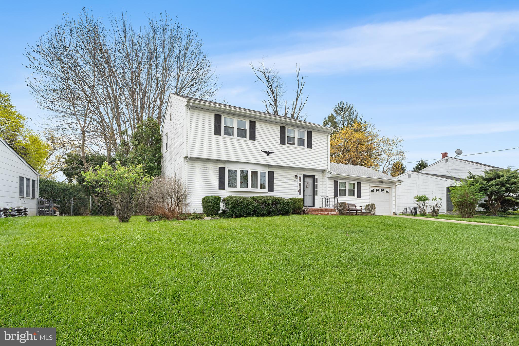 80 Nancy Lane Ewing, NJ 08638 - Photo 2 of 33 a view of a house with a big yard and large trees