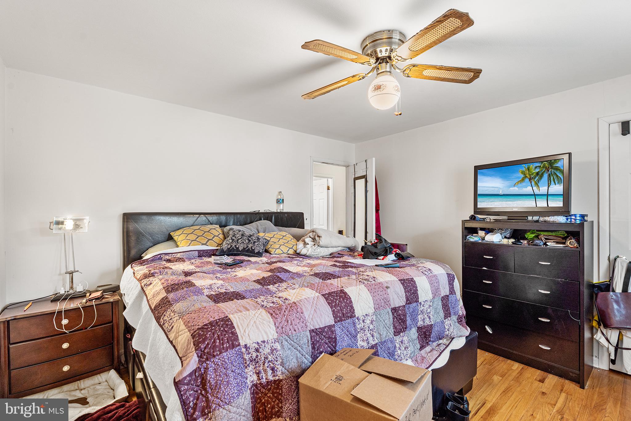80 Nancy Lane Ewing, NJ 08638 - Photo 21 of 33 a bedroom with a bed and a chandelier
