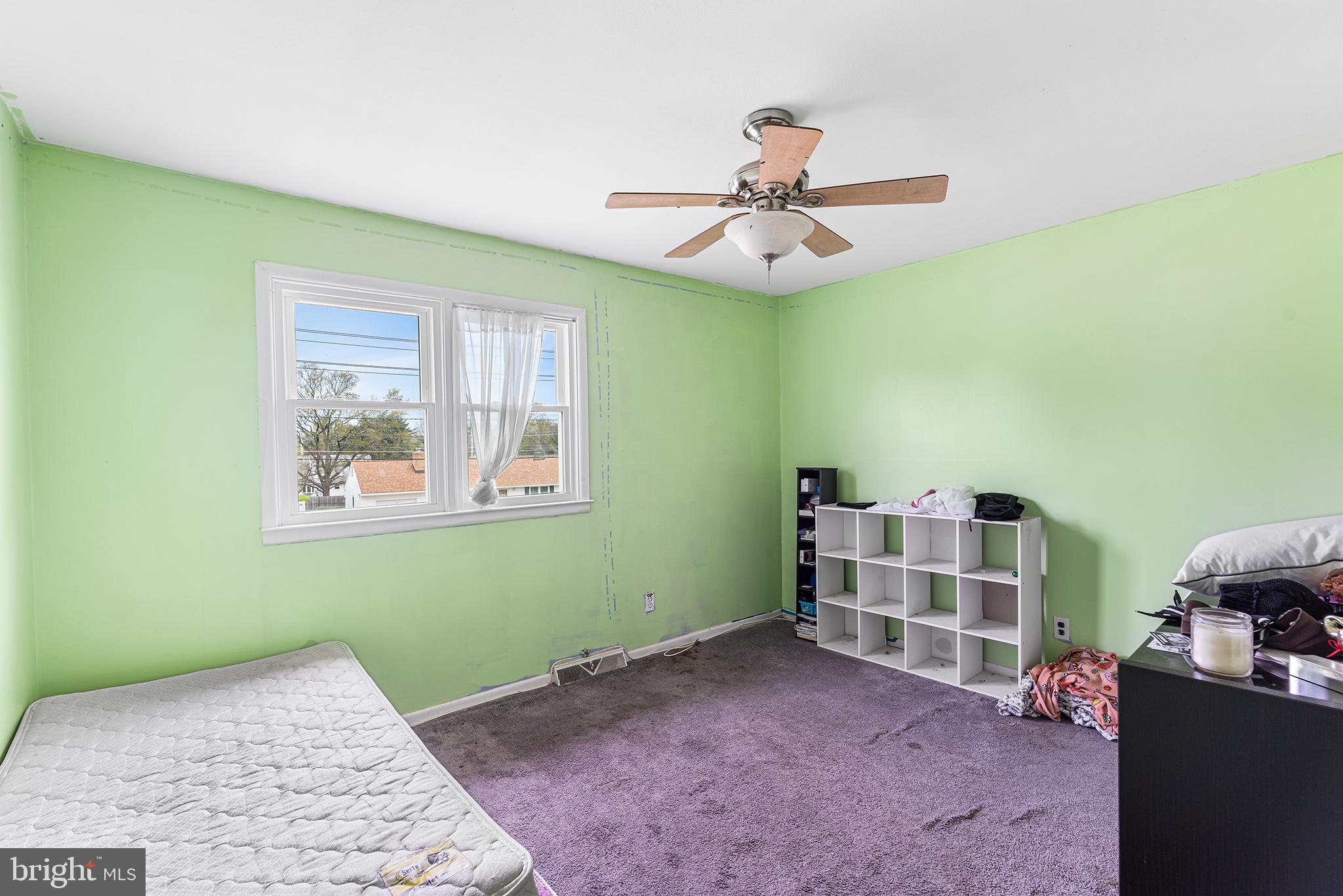 80 Nancy Lane Ewing, NJ 08638 - Photo 24 of 33 a view of a livingroom with furniture and a ceiling fan