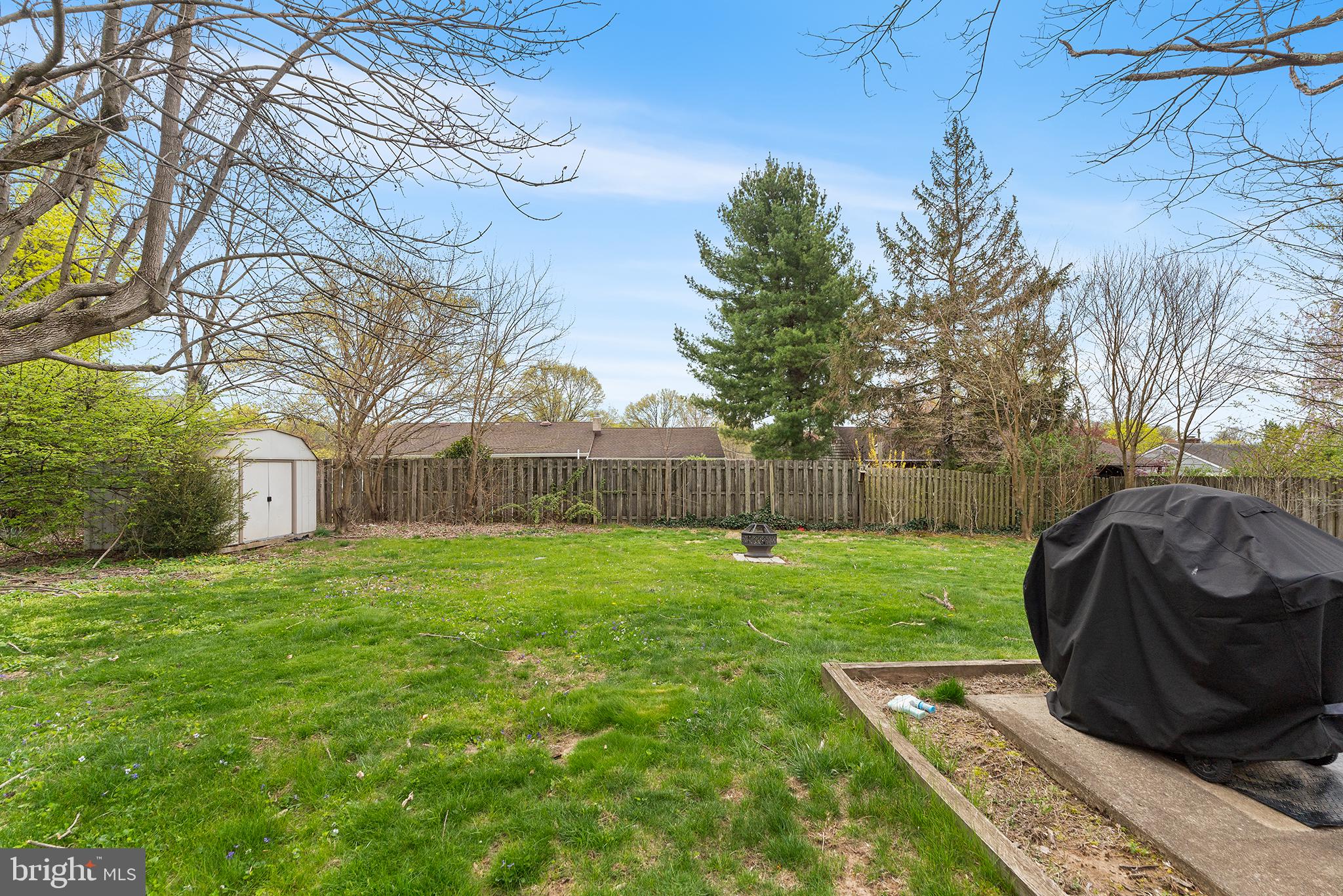80 Nancy Lane Ewing, NJ 08638 - Photo 31 of 33 a view of a backyard with a garden and trees