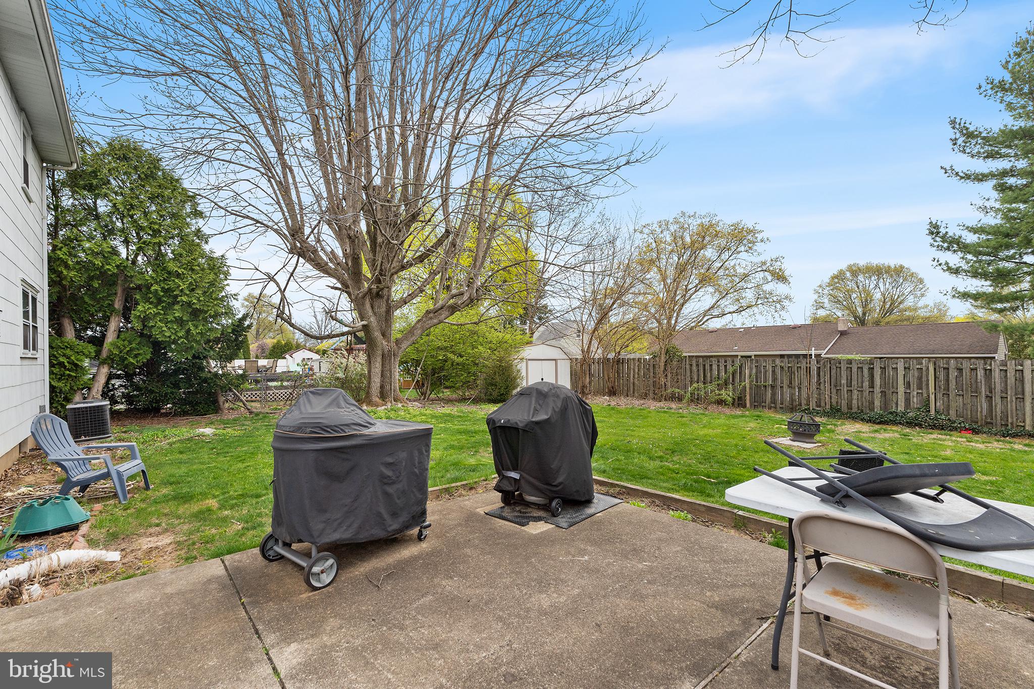 80 Nancy Lane Ewing, NJ 08638 - Photo 32 of 33 a view of backyard with outdoor seating ad green space