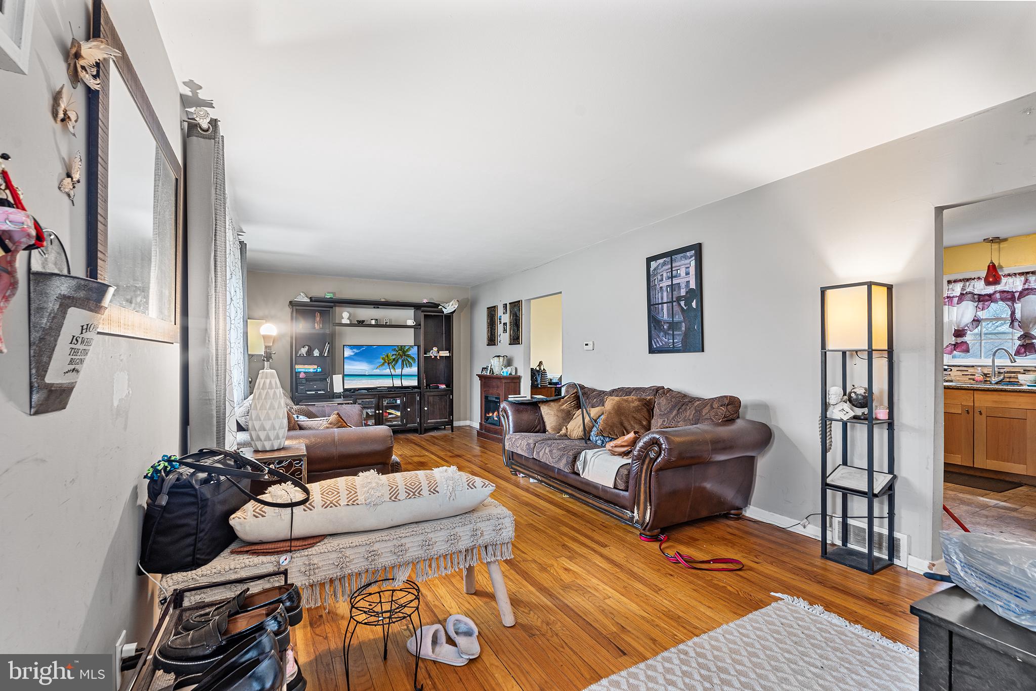80 Nancy Lane Ewing, NJ 08638 - Photo 4 of 33 a living room with furniture and a fireplace