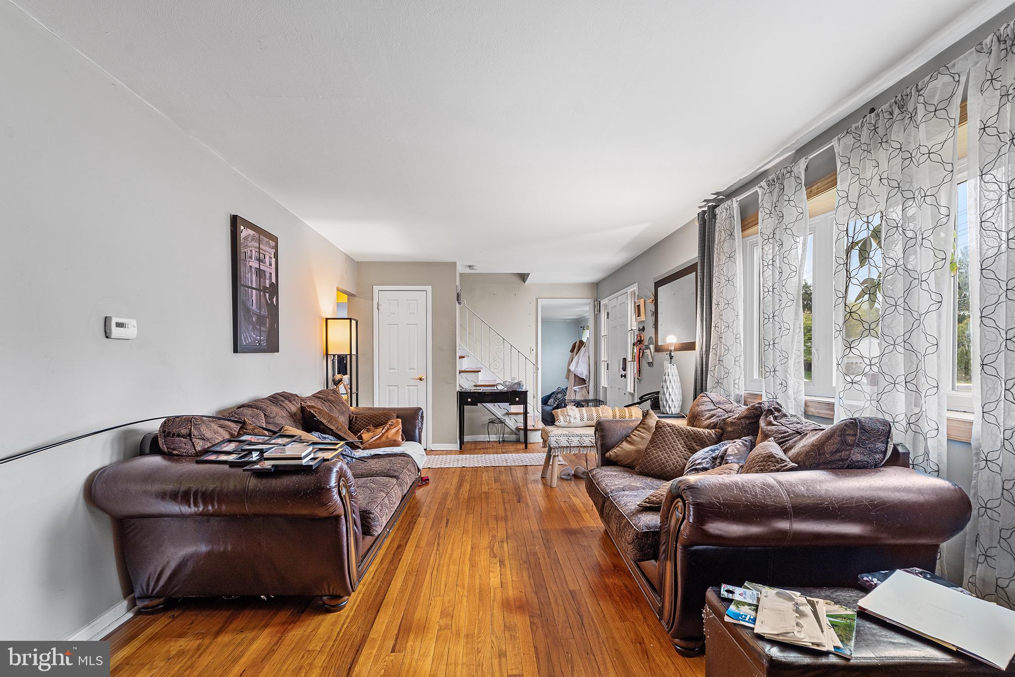 80 Nancy Lane Ewing, NJ 08638 - Photo 6 of 33 a living room with furniture and a large window