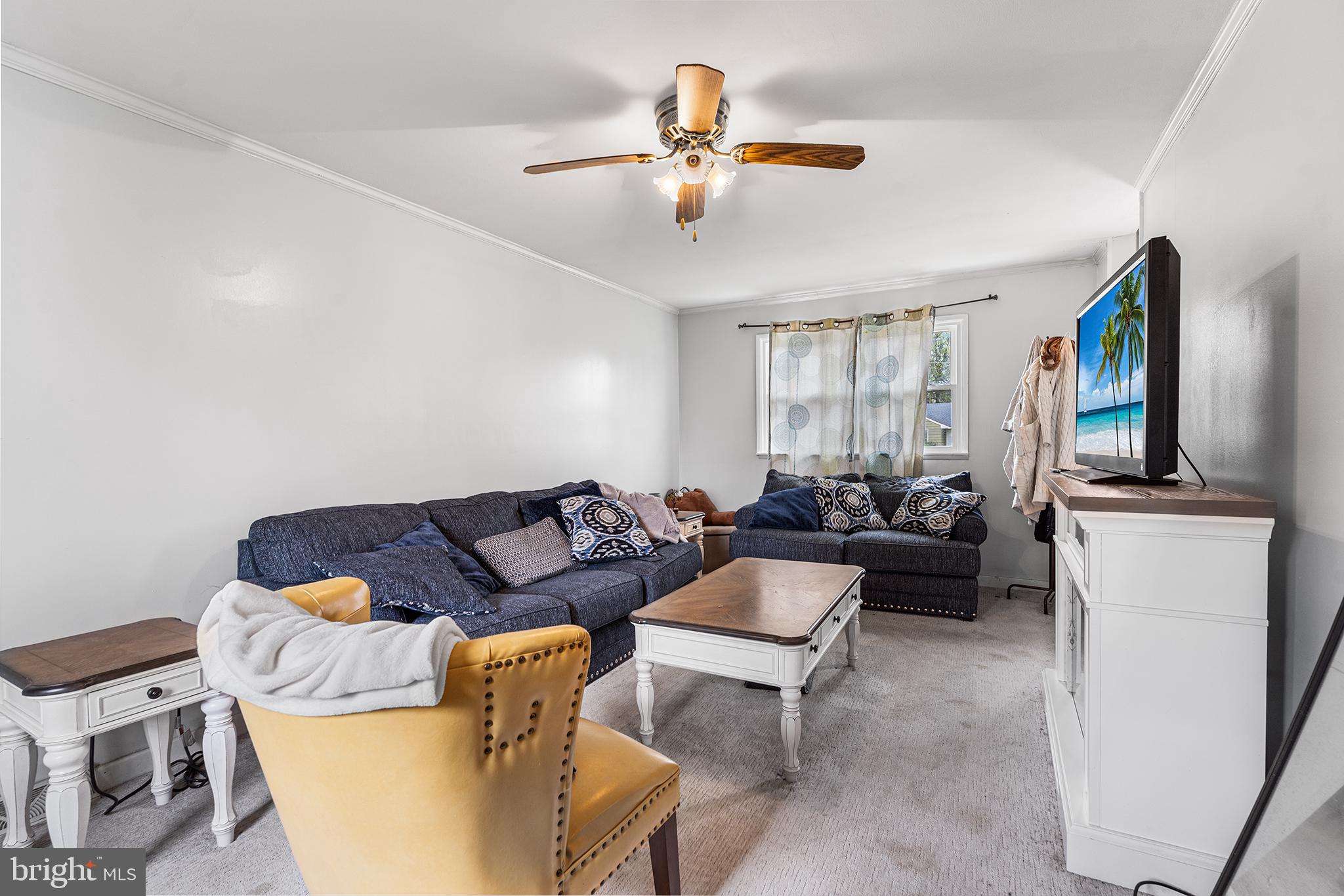 80 Nancy Lane Ewing, NJ 08638 - Photo 10 of 33 a living room with furniture and a flat screen tv