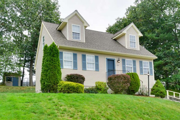 237 Acropolis Road Lowell, MA 01854 - Photo 1 of 22 a view of front of a house with a yard