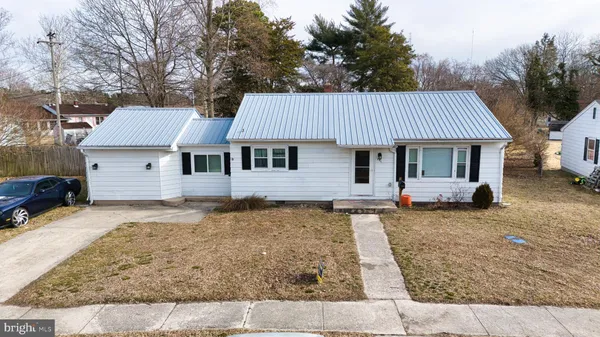 front view of a house with a patio