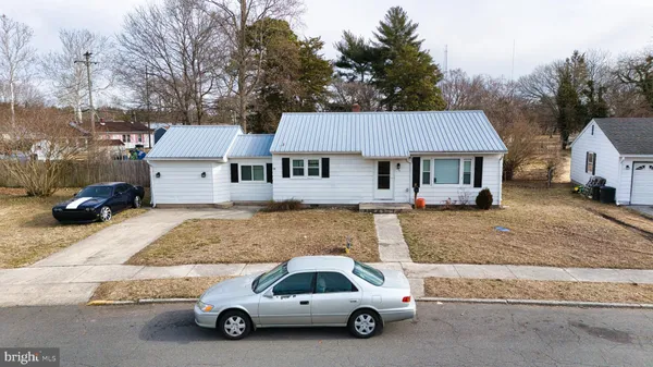 a car parked in front of a house
