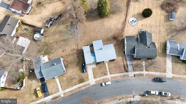 an aerial view of houses with outdoor space