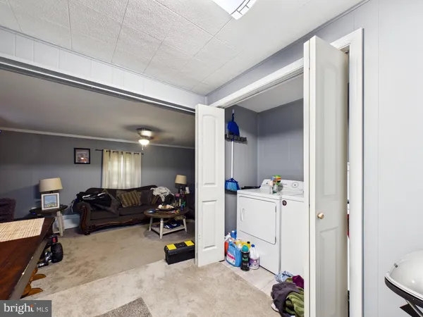 a view of a room with furniture and toys