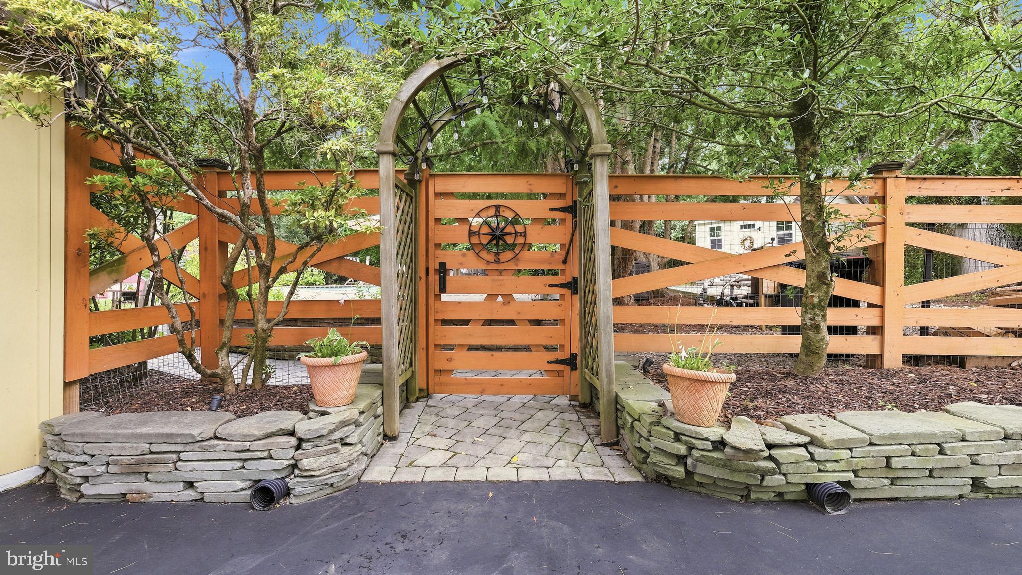17 Stringer Drive Doylestown, PA 18901 - Photo 6 of 80 Charming garden gate invites exploration.