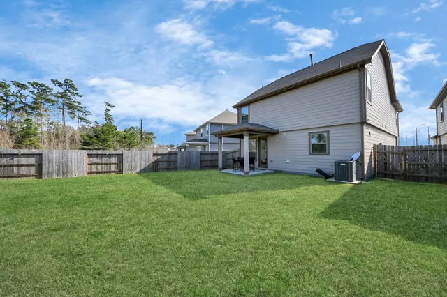 a balcony view with furniture and garden view