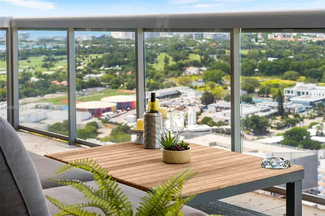 a bathroom with double sink and a mirror
