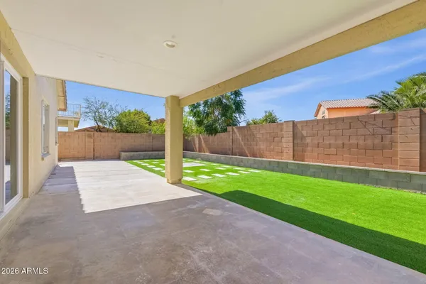 a view of backyard with green space