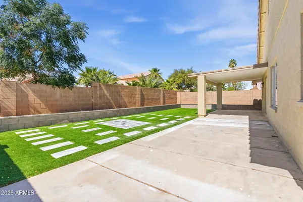 a view of a backyard with a garden