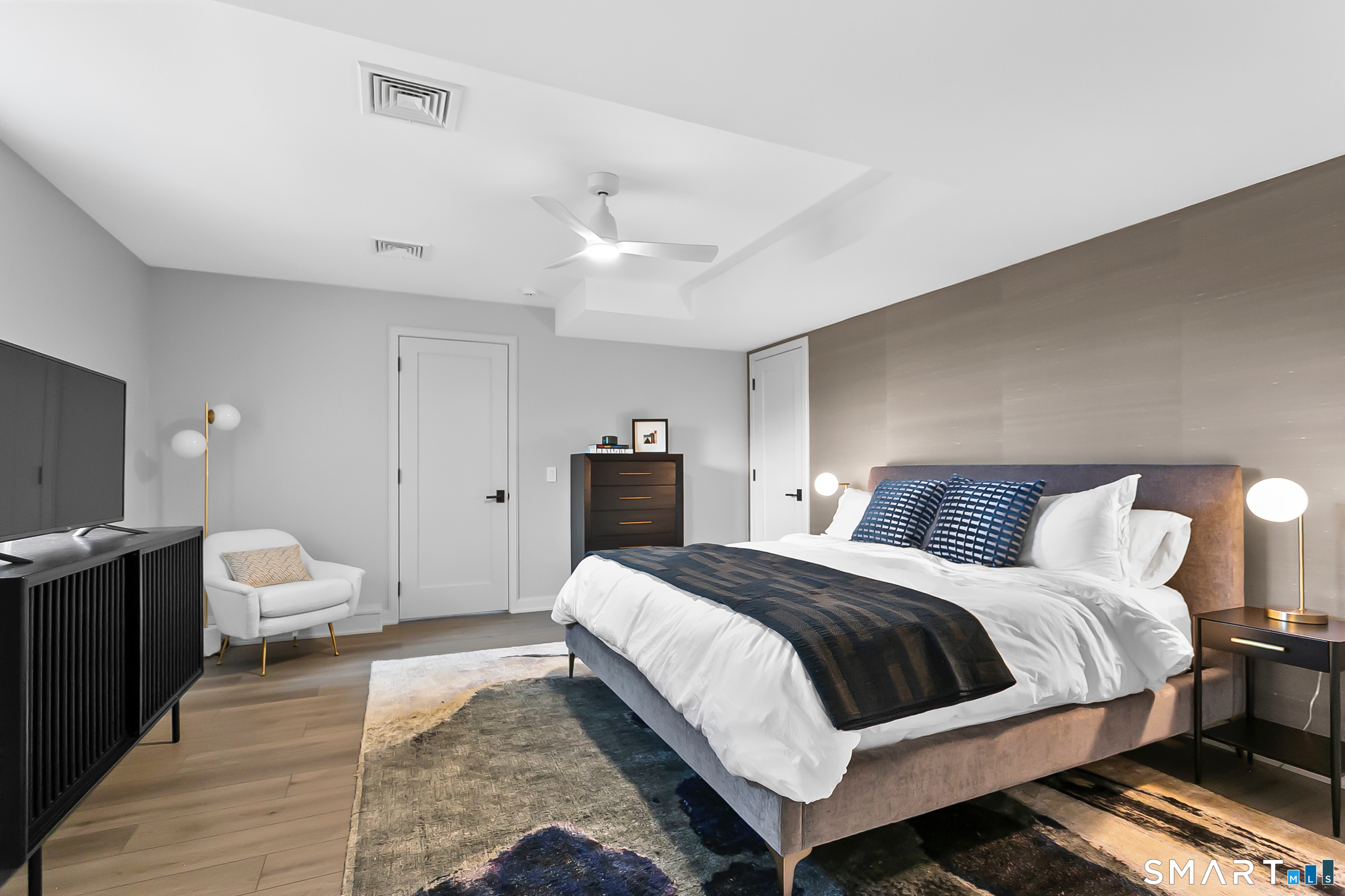 30 Lords Highway Weston, CT 06883 - Photo 14 of 24 a bedroom with a bed and a tv