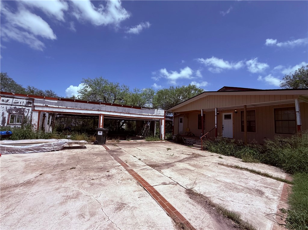 5742 Hidden Valley Loop Sandia, TX 78383 - Photo 20 of 32 a front view of a house with a yard