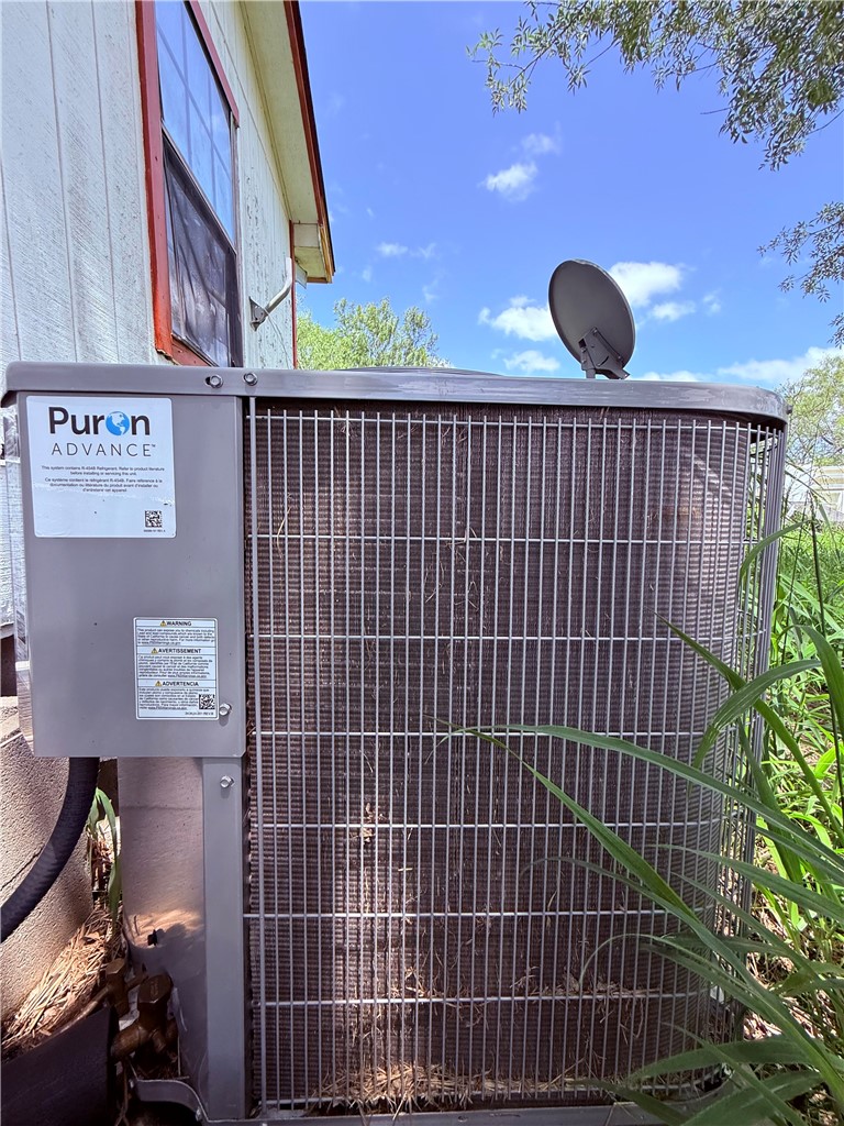 5742 Hidden Valley Loop Sandia, TX 78383 - Photo 26 of 32 a view of a door with a potted plant