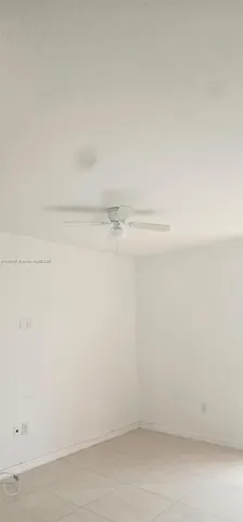 a kitchen with a stove and a cabinet