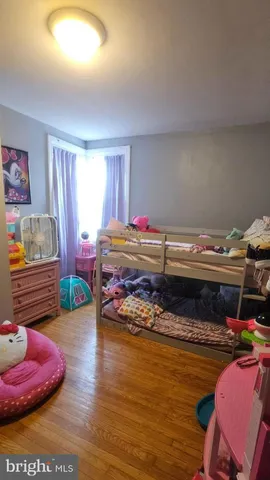 a bed room with furniture and a couch