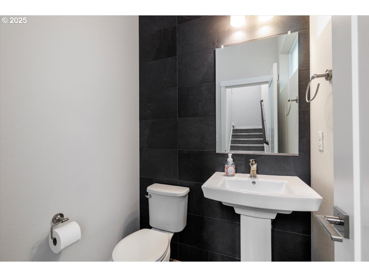 961 Southwest Stellar Terrace Beaverton, OR 97005 - Photo 14 of 25 a bathroom with a sink and a toilet