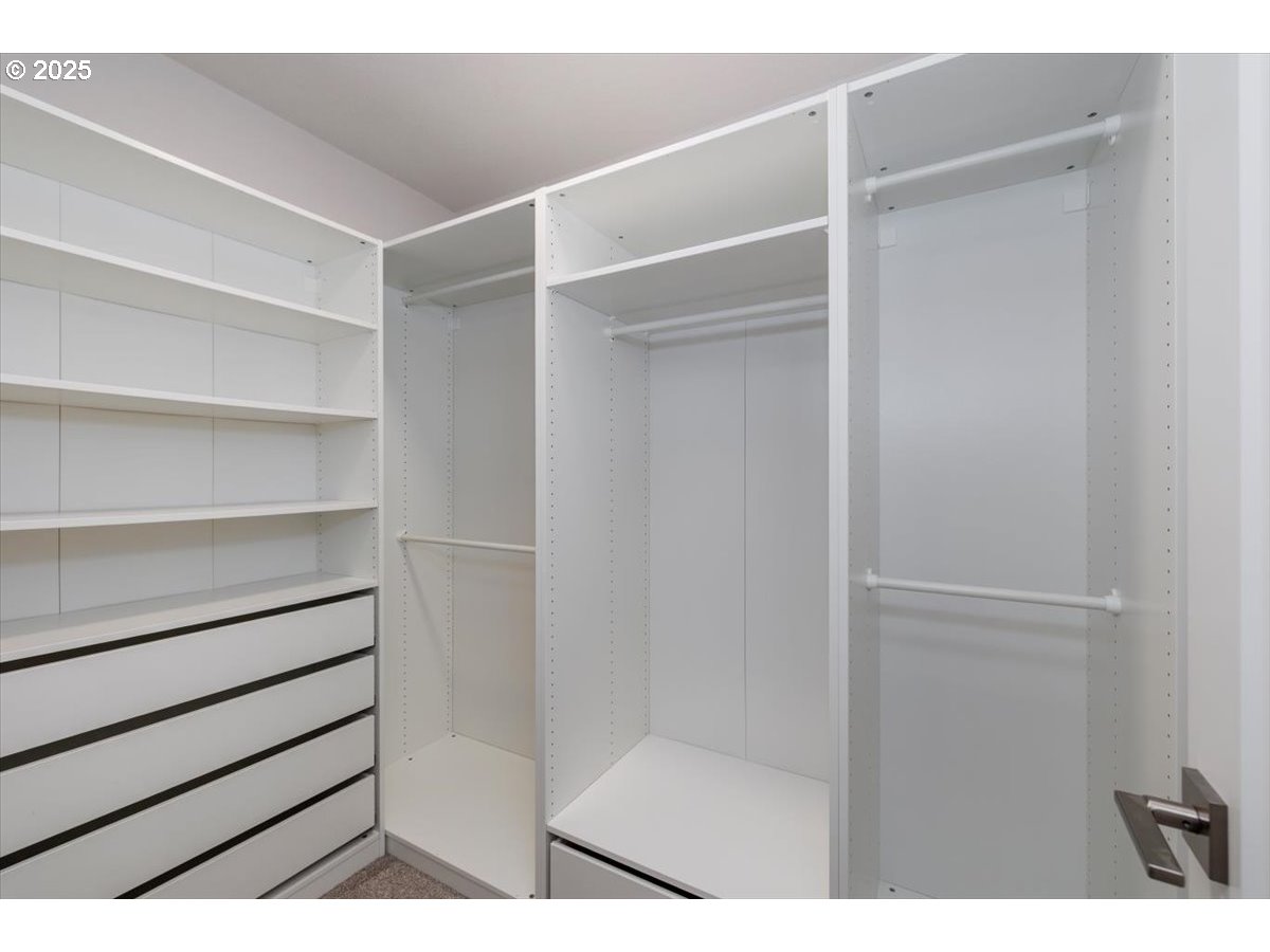 961 Southwest Stellar Terrace Beaverton, OR 97005 - Photo 18 of 25 a view of room with white door and closet
