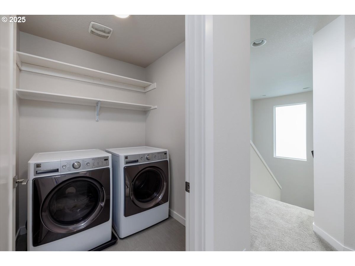 961 Southwest Stellar Terrace Beaverton, OR 97005 - Photo 22 of 25 a utility room with dryer and washer