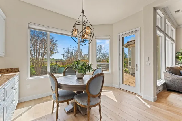 a bedroom with a bed couch and window