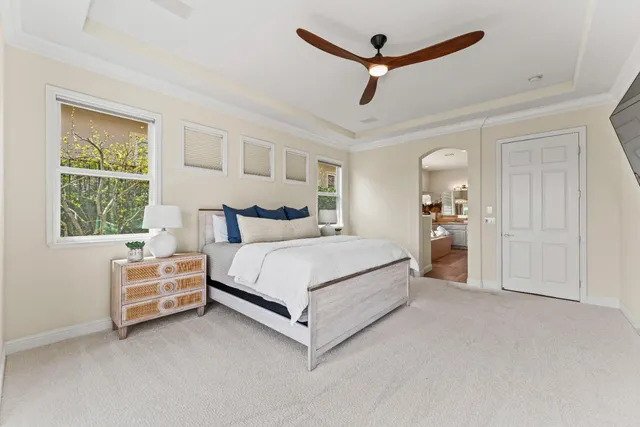 a large bathroom with a granite countertop sink mirror and bathtub