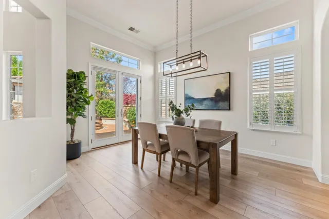 a view of washer and dryer with wooden floor