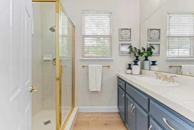 a view of a patio with couches and potted plants