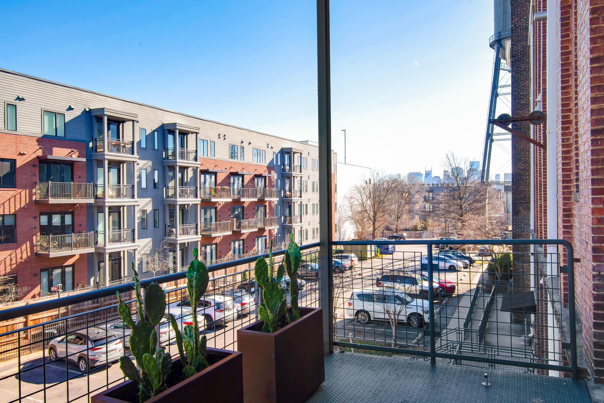 1400 Rosa L Parks Boulevard, Unit 216 Nashville, TN 37208 - Photo 14 of 29 a view of a balcony with furniture