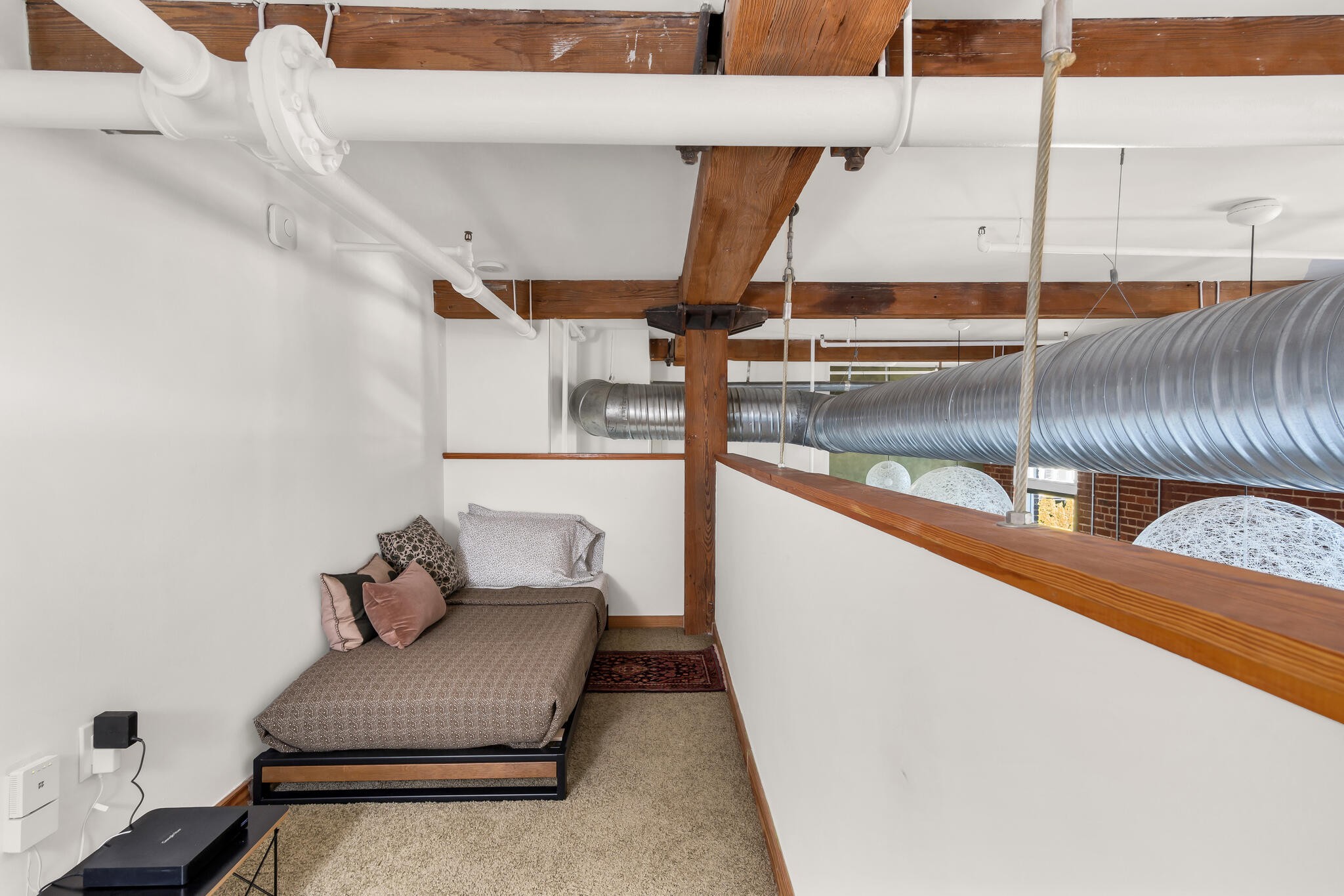 1400 Rosa L Parks Boulevard, Unit 216 Nashville, TN 37208 - Photo 17 of 29 view of living room with furniture and window